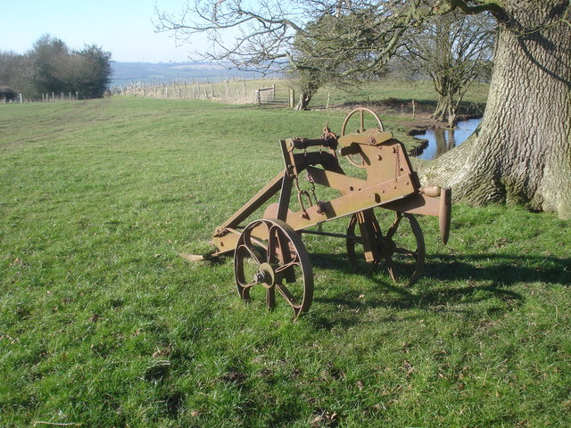 Mole plough equipment — a towed plow that creates subsurface drainage channels in the soil