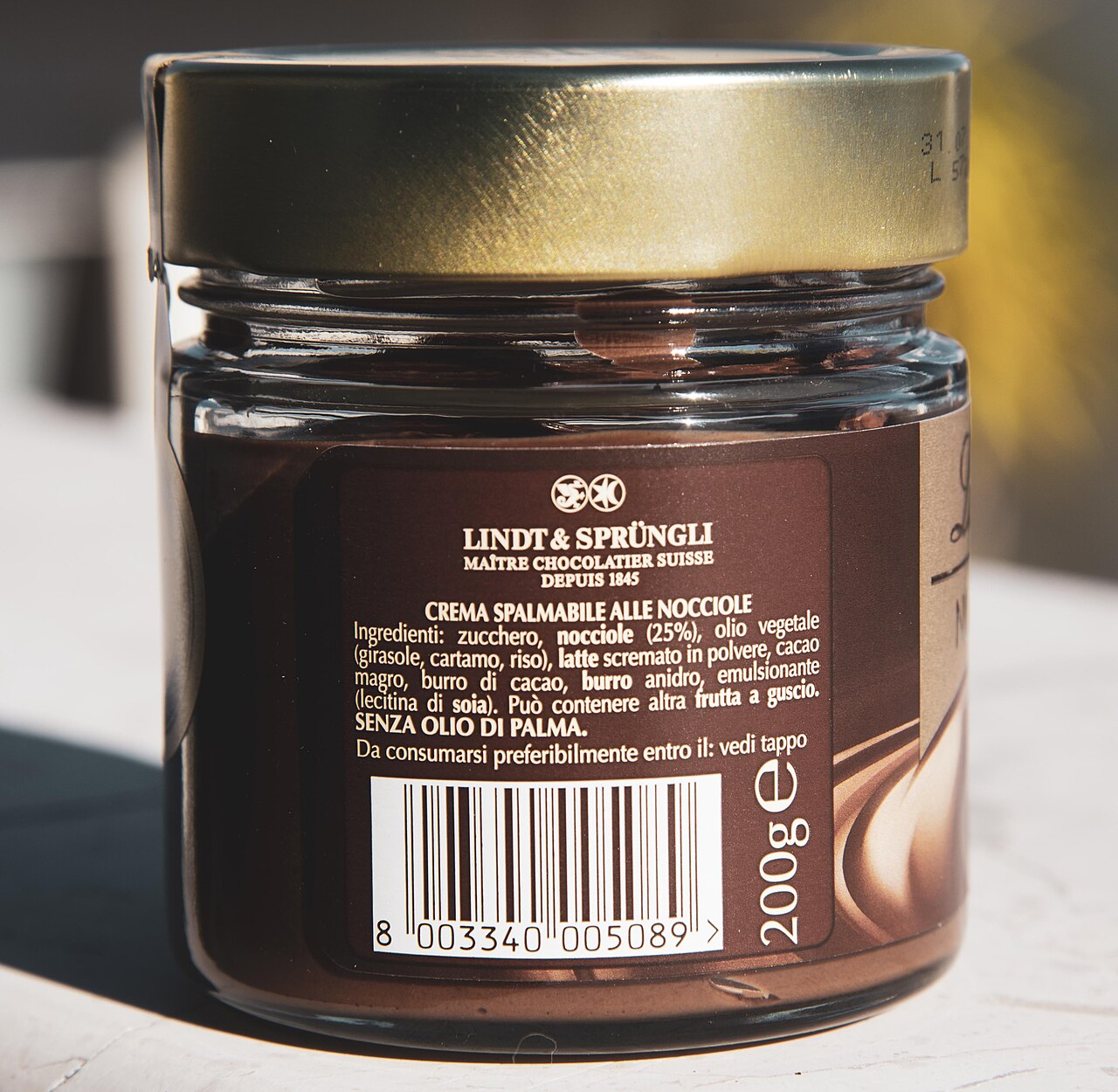 Chocolate-hazelnut spread in a jar with hermetic lid