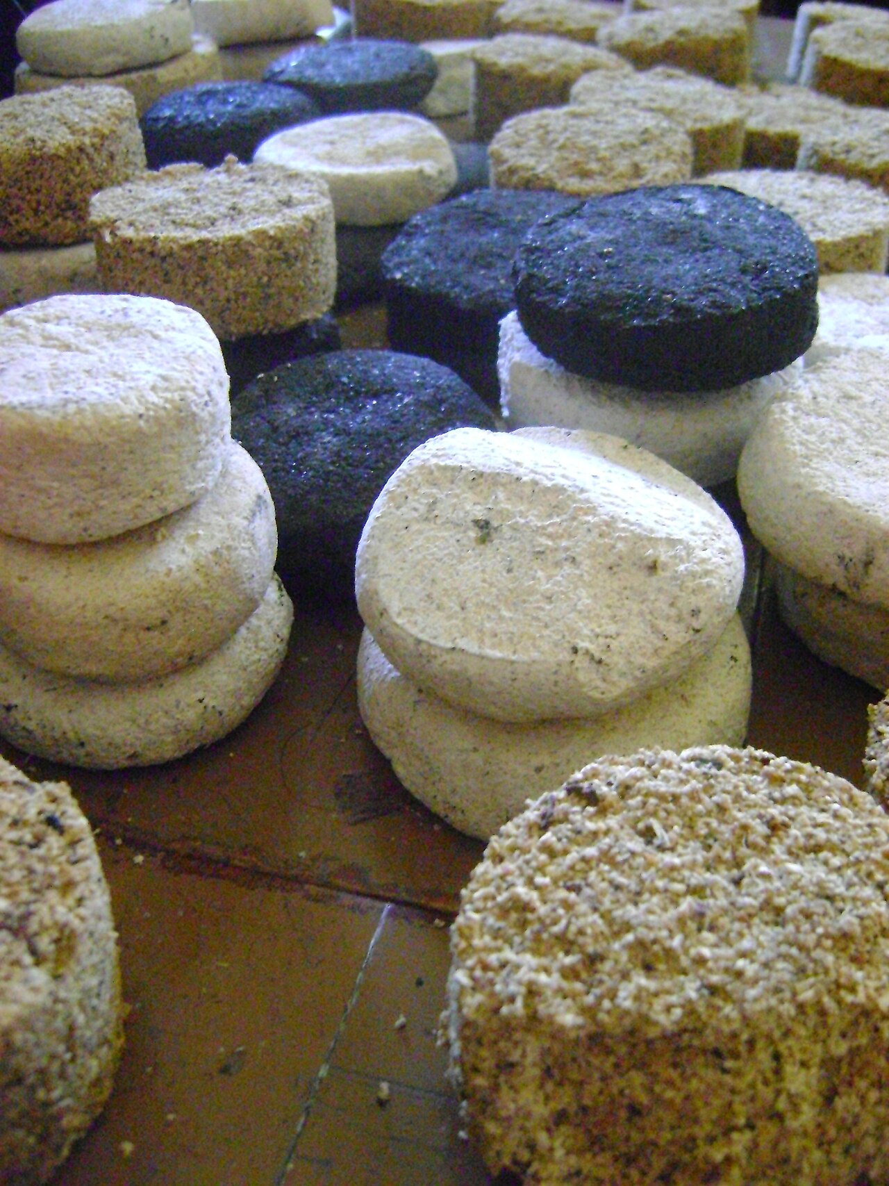 Biomass briquette (sawdust) — example of densified fuel with higher density
