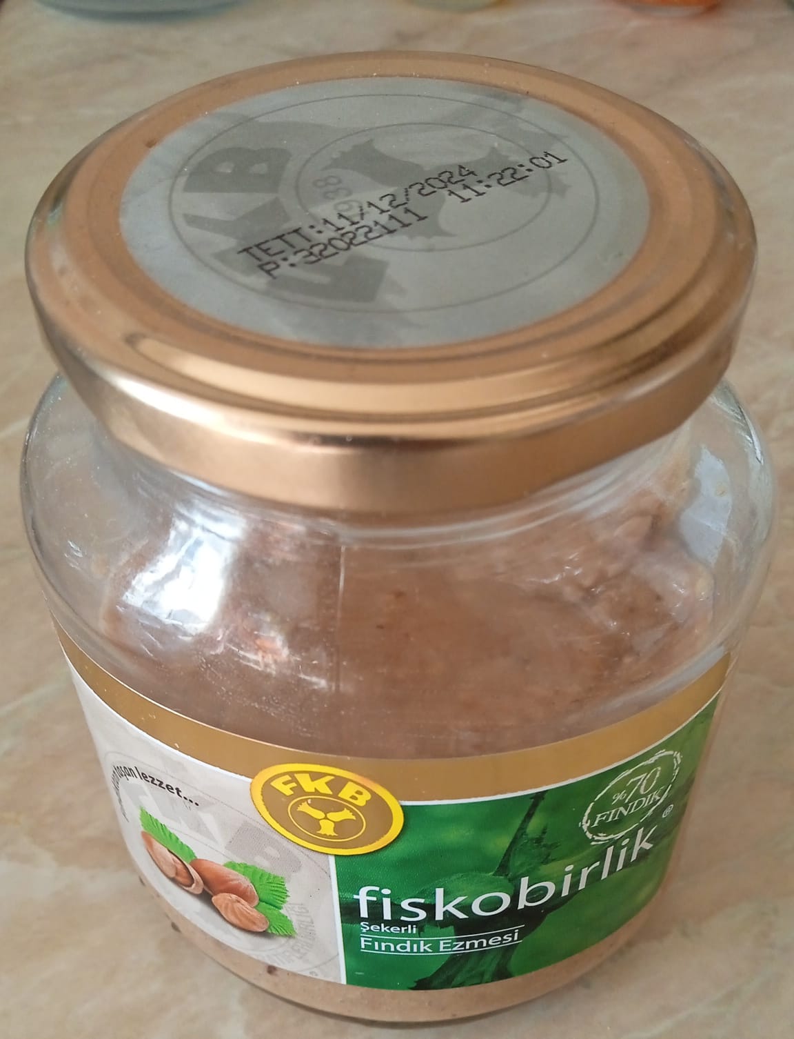 Hazelnut butter (ground kernel) in a glass jar