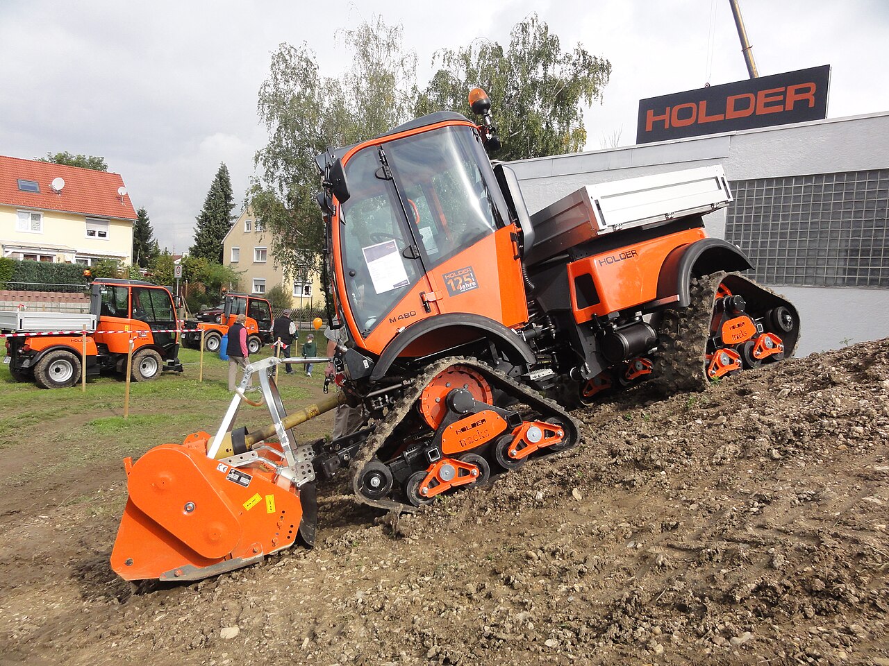 Tractor with atomizer in the orchard — a machine with high annual utilization