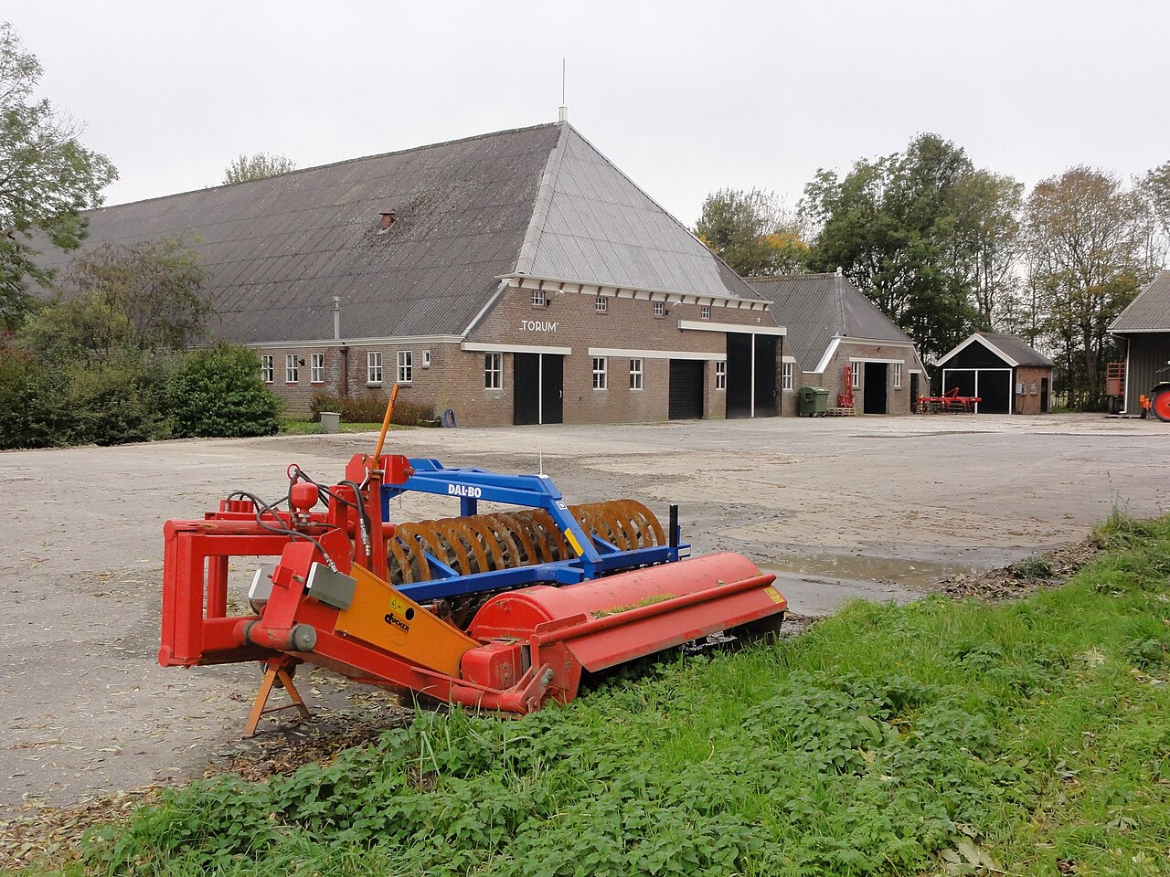 Agricultural machinery in farmyard